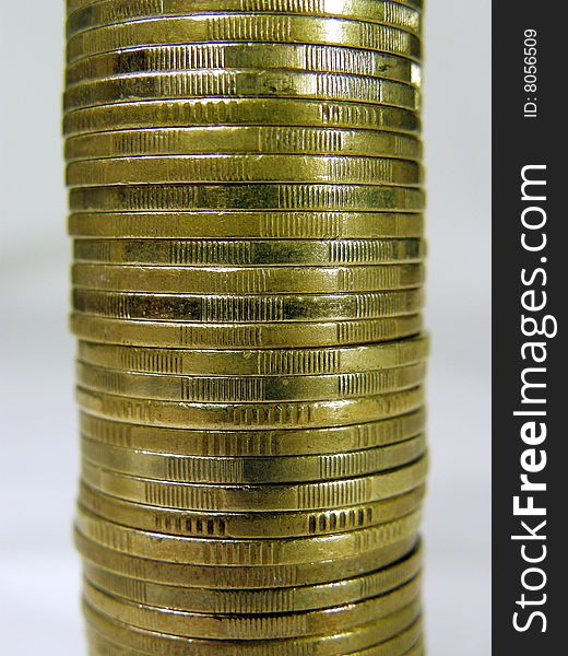 Pile folded coins. Coins stock