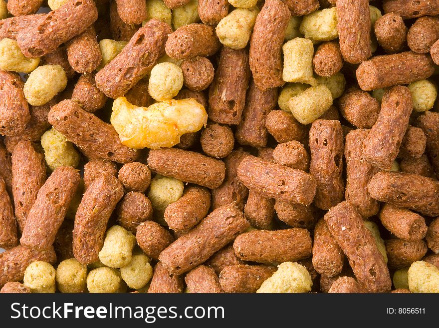 A close-up of a lot of dry reptile food. A close-up of a lot of dry reptile food