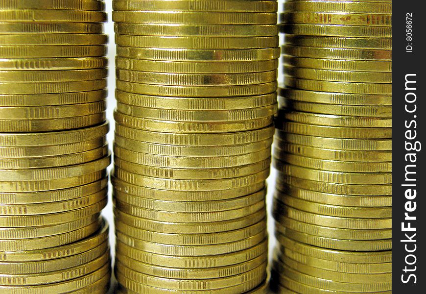 Pile folded coins. Coins stock