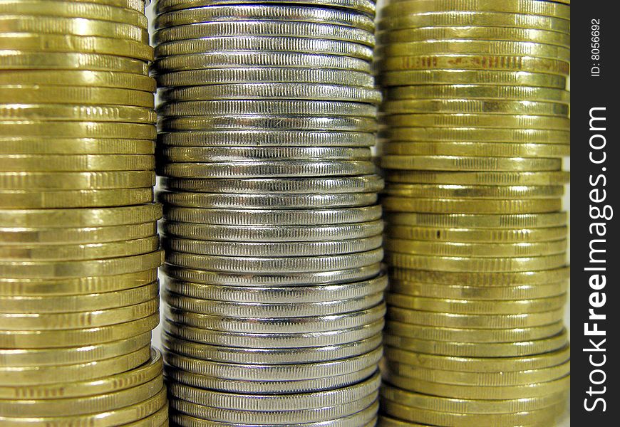 Pile folded coins. Coins stock