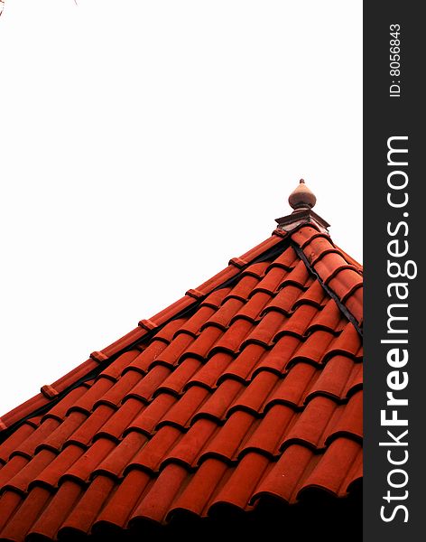 A ceramic tiled rooftop of a gazebo infront of a white background