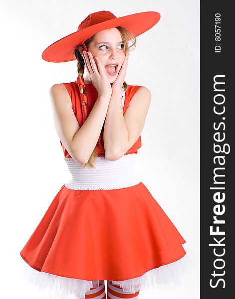 Surprised girl in red hat posing mouth open