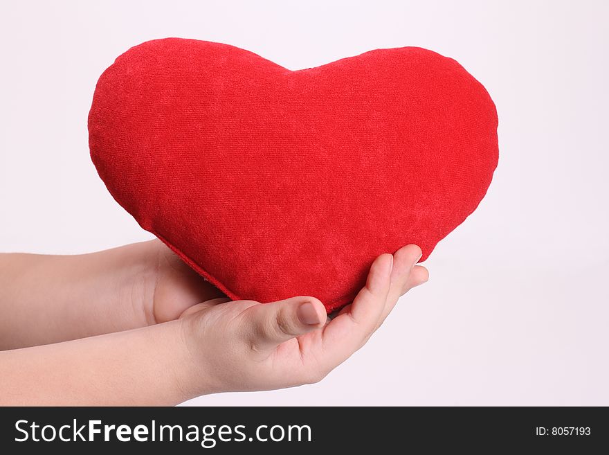 Big heart in the hands of the small gift. Big heart in the hands of the small gift