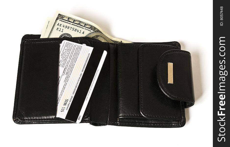 Black billfold with dollars