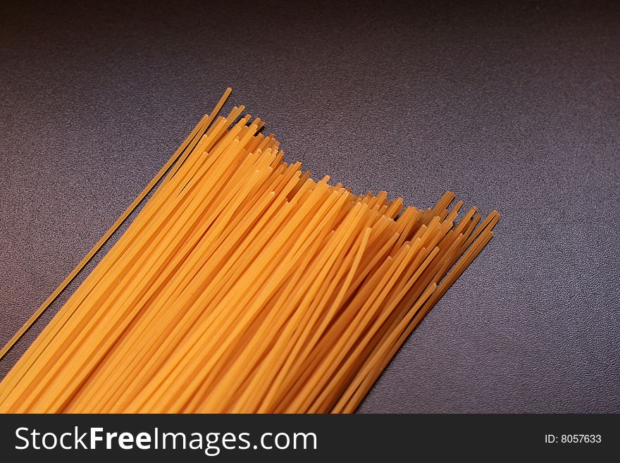 Italian spaghetti on a black background