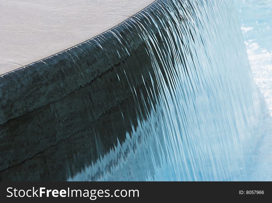 Detail view of a swimming pool waterfall