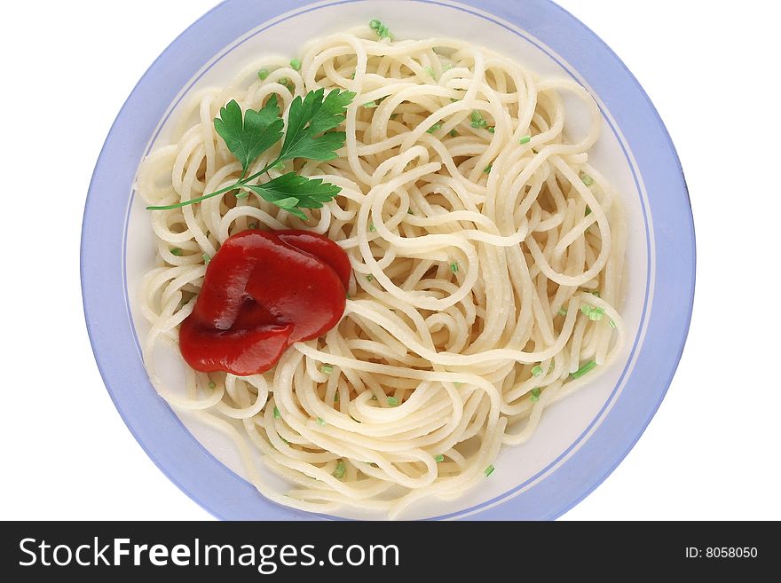 Spaghetti on a dish with parsley and ketchup