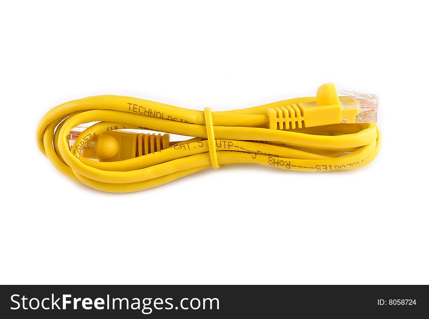 Yellow network cable neatly wound and secured with a matching twist-tie isolated on white. Yellow network cable neatly wound and secured with a matching twist-tie isolated on white