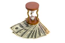 Dollars And Hourglass On White. Stock Photos Dollars And Hourglass On White. Stock Photos