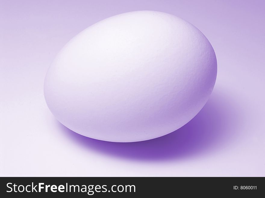 An egg in violet lighting for Easter.