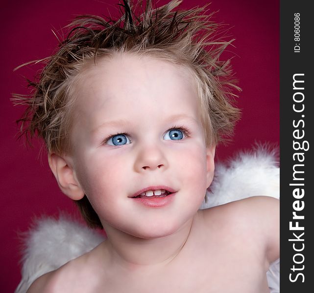 Close up of Angel Boy with beautiful blue eyes. Close up of Angel Boy with beautiful blue eyes