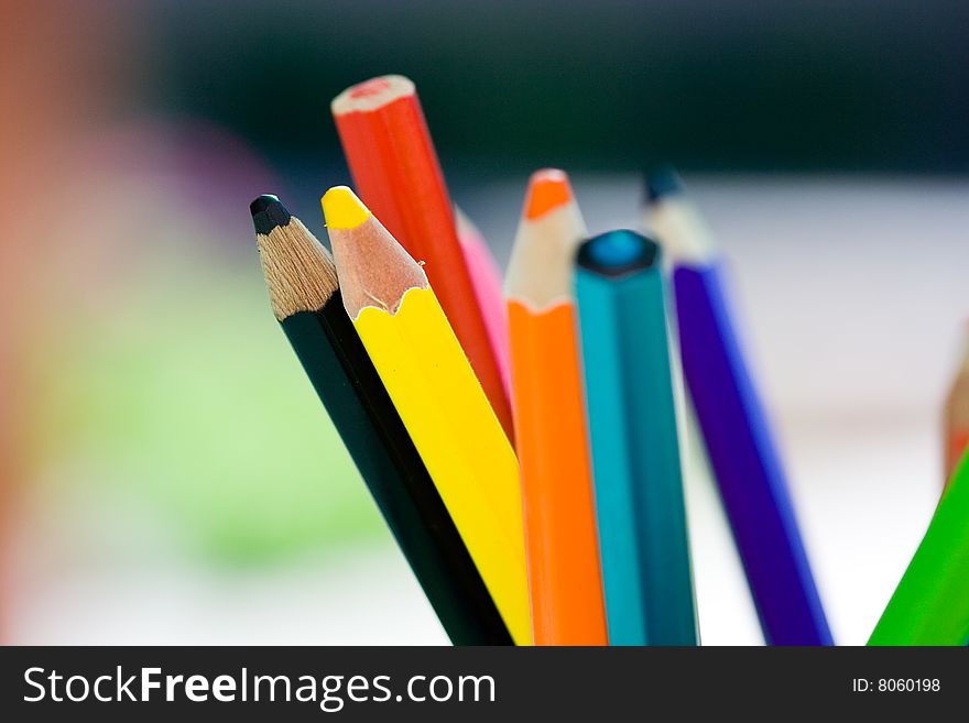 Closeup of colorful crayons symbol