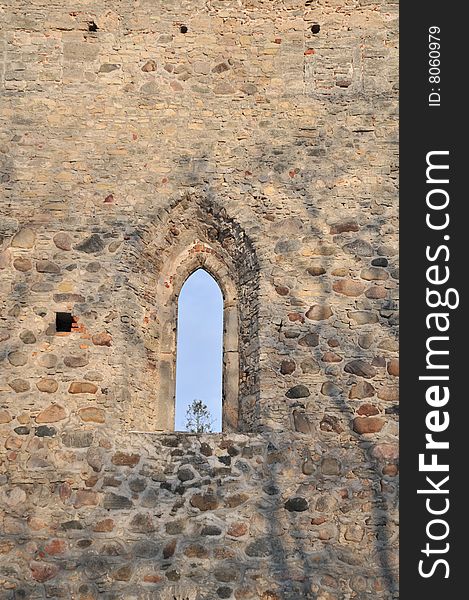 Castle / church ruins, window in the wall. Castle / church ruins, window in the wall.