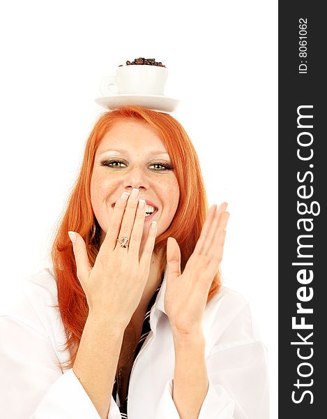 Young red-haired girl in the dress of the secretary poses with a coffee cup. Pictures well approach for advertising of coffee and cafe. Young red-haired girl in the dress of the secretary poses with a coffee cup. Pictures well approach for advertising of coffee and cafe