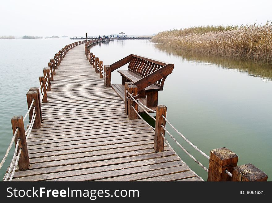 A long plank road on the water