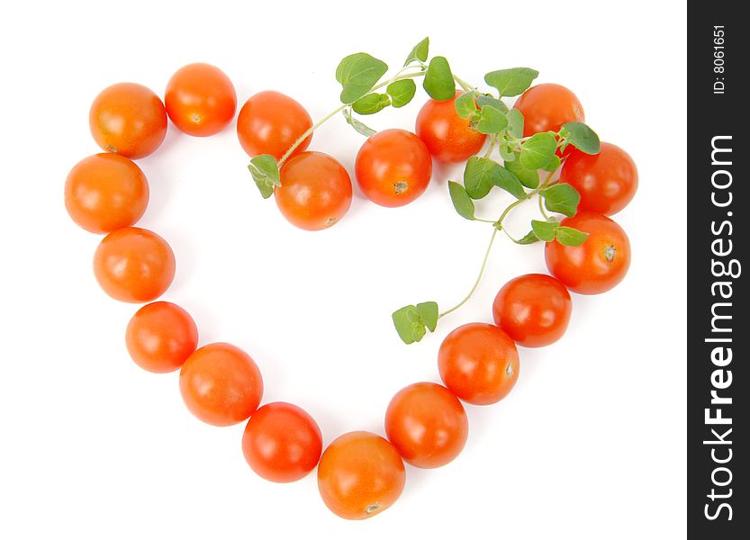 Cherry tomatoes making heart shape. Cherry tomatoes making heart shape