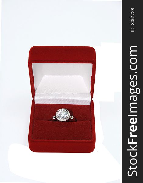 Golden ring with diamond in red box