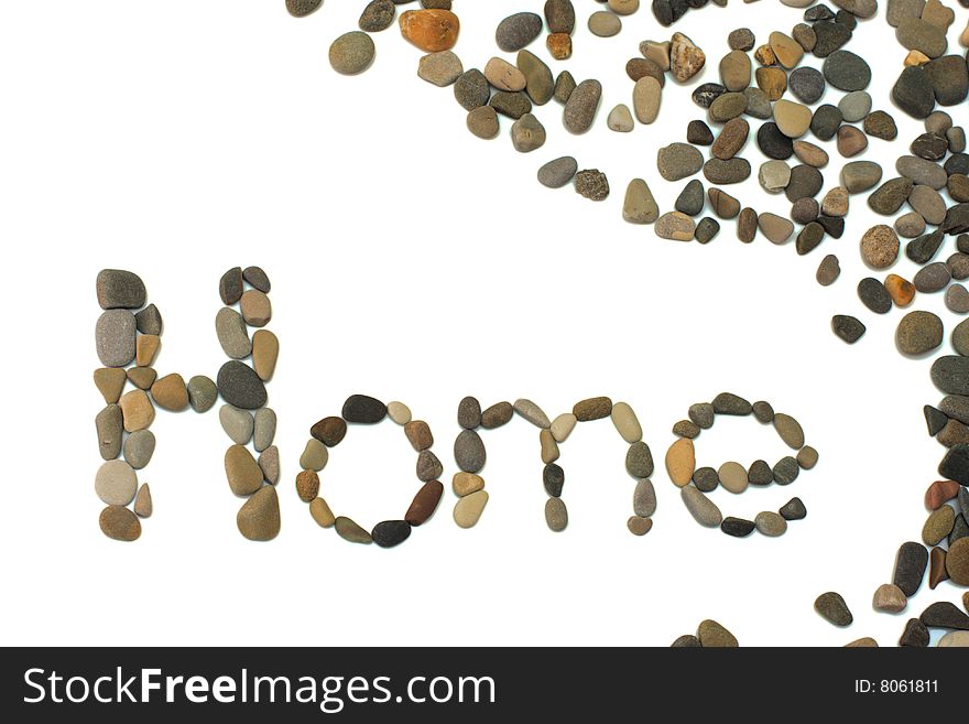 The word home written using pebbles