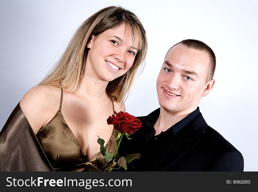 Couple With A Rose Smiling
