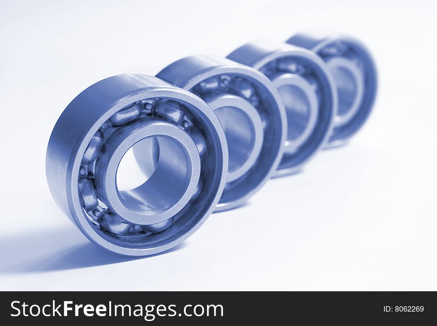Four bearings. The photo is made by close up and colorized dark blue colour.