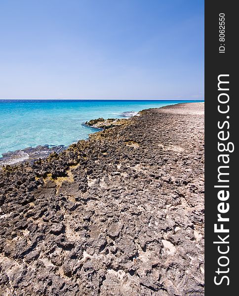 Rocky shore with a nice turquoise sea horizon