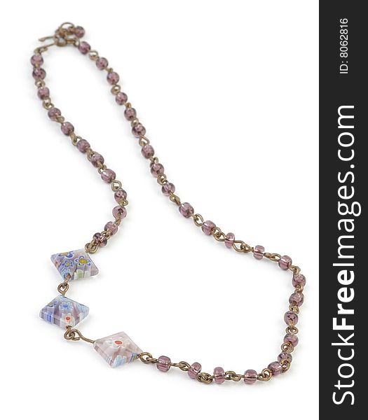 Coppery Necklace with Beads on white background. Soft focus.