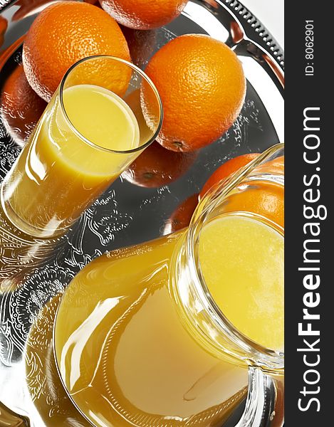 Orange juice on silver tray