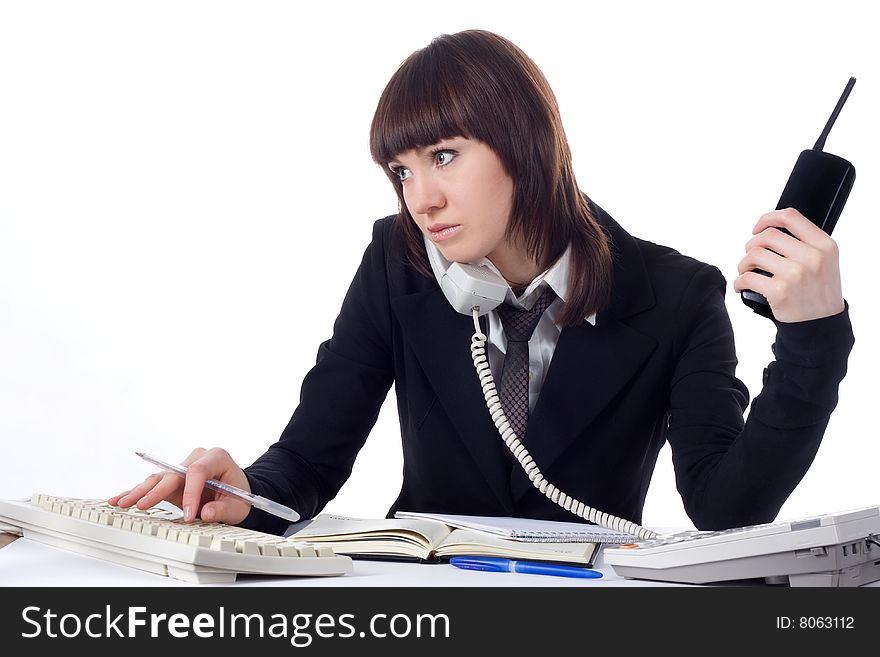 Young beautiful business lady working at a desk.