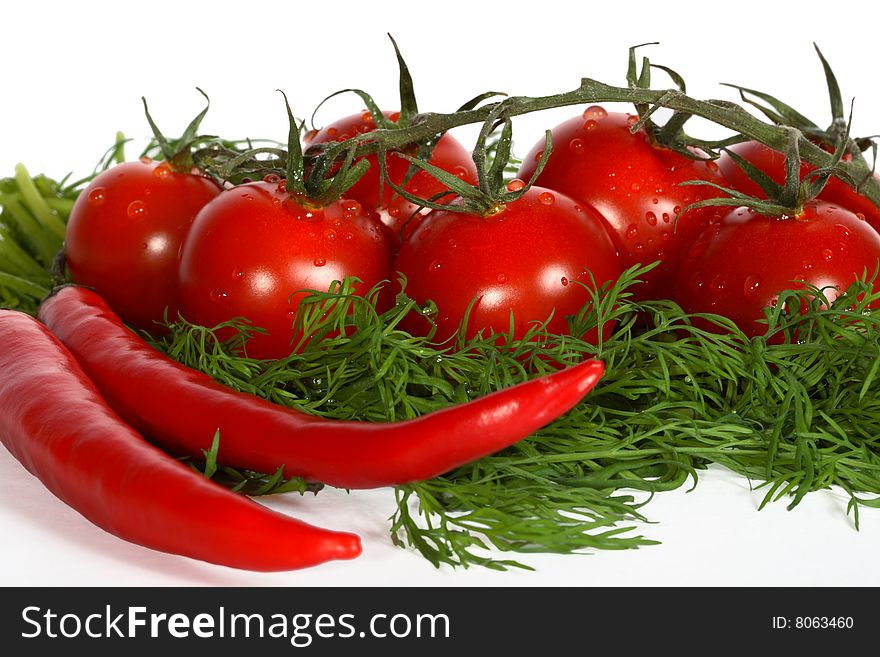 Tomatoes, dill and red hot pepper isolated on white