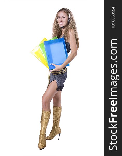 The young beautiful businesswoman at office behind work on a white background. The young beautiful businesswoman at office behind work on a white background