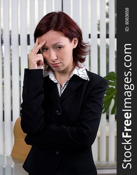 Young business woman in the modern office. Young business woman in the modern office