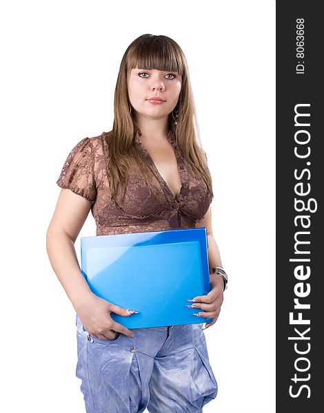 The young beautiful businesswoman at office behind work on a white background. The young beautiful businesswoman at office behind work on a white background