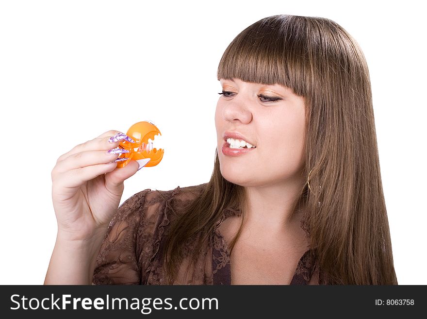 The young beautiful businesswoman at office behind work on a white background. The young beautiful businesswoman at office behind work on a white background