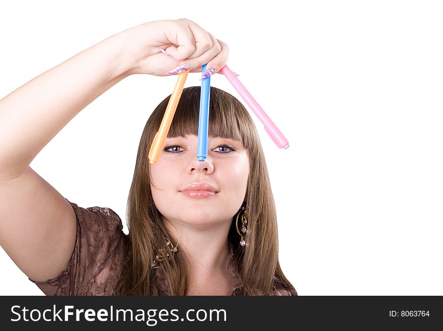 The young beautiful businesswoman at office behind work on a white background. The young beautiful businesswoman at office behind work on a white background