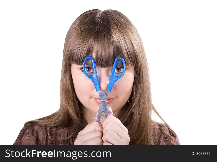 The young beautiful businesswoman at office behind work on a white background. The young beautiful businesswoman at office behind work on a white background