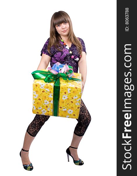 The young beautiful girl with a gift box on a white background