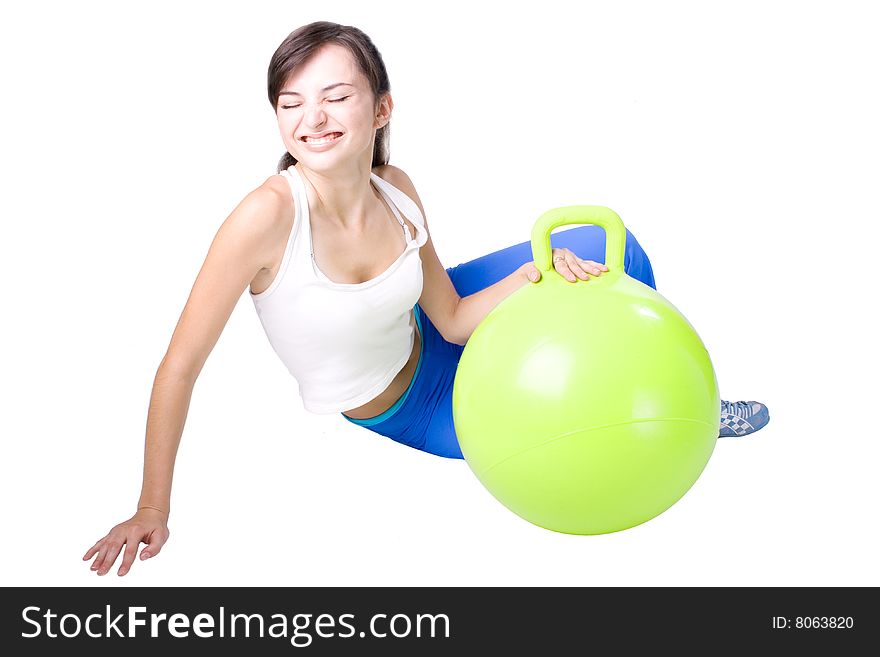The young beautiful girl engaged in fitness on a white background