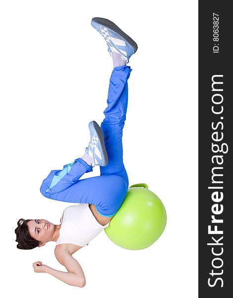 The young beautiful girl engaged in fitness on a white background