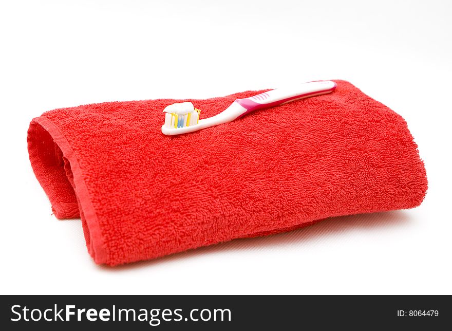 Toothbrush on a red towel