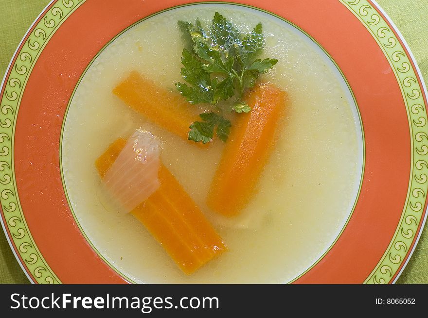Fish vegetable soup carrots parsey