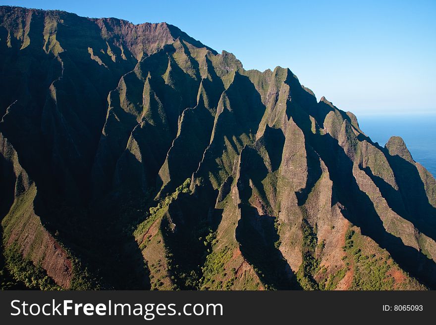 Wrinkled cliff face on Na Pali coast in Kauai