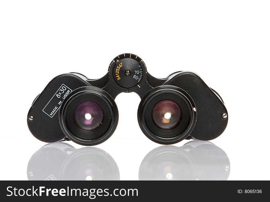 Old vintage soviet binoculars isolated on white. Old vintage soviet binoculars isolated on white