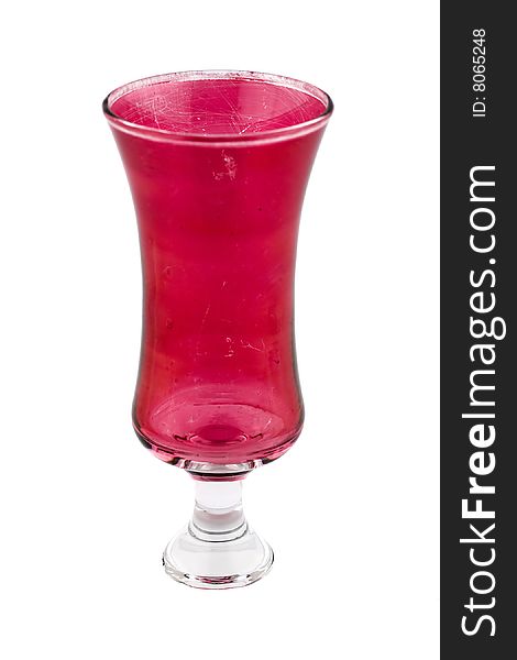 Red scratched Glass with little foot isolated on white.