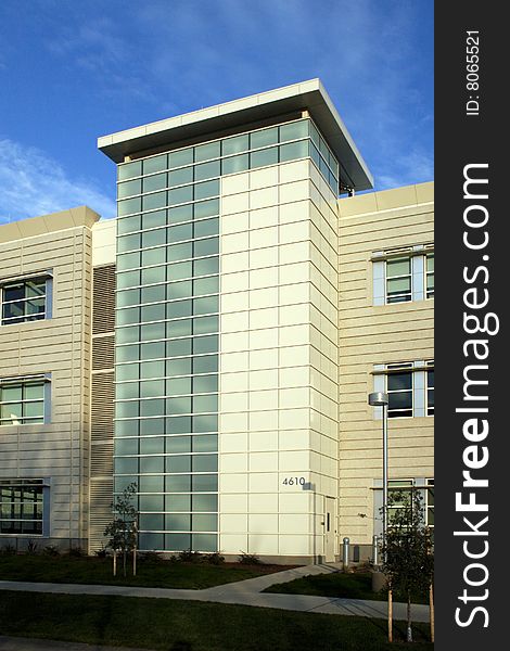 An office building with a empty parking lot