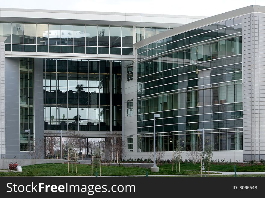 An office building with a empty parking lot