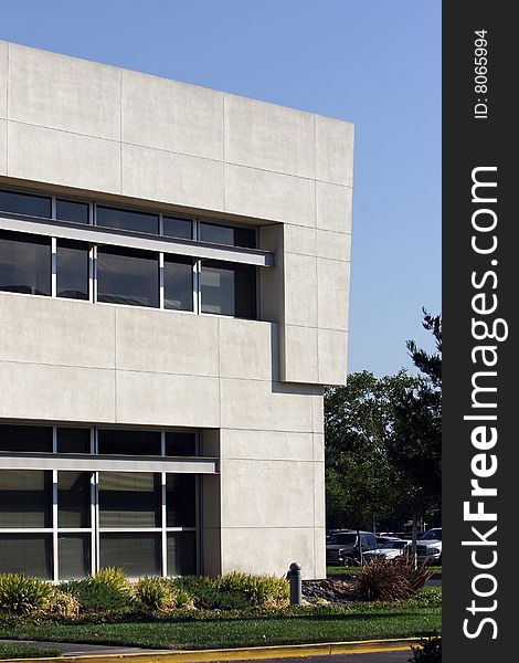 An office building with a empty parking lot