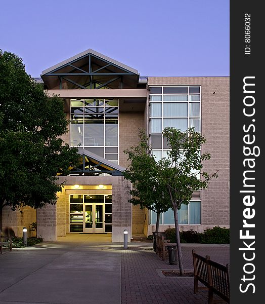 An office building with a empty parking lot