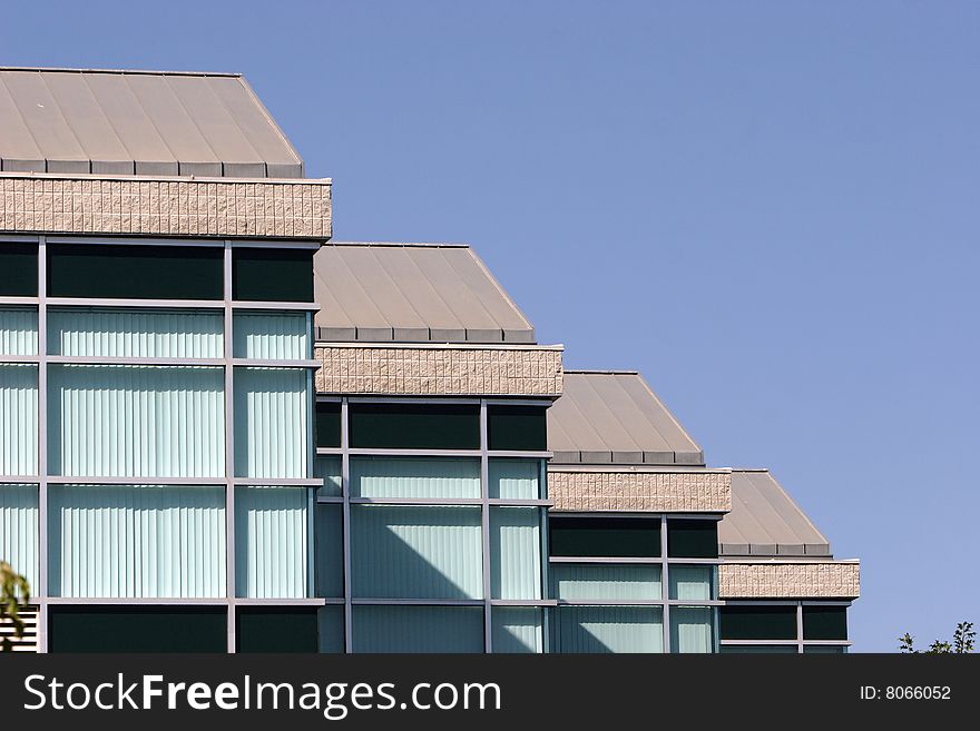 An office building with a empty parking lot