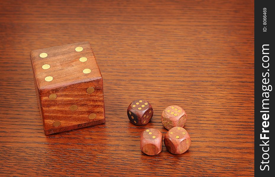 Wood dices with metallic points. Wood dices with metallic points