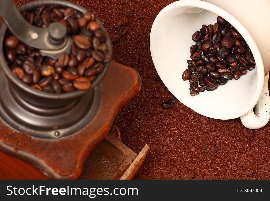 Detail of coffee grinder and cup